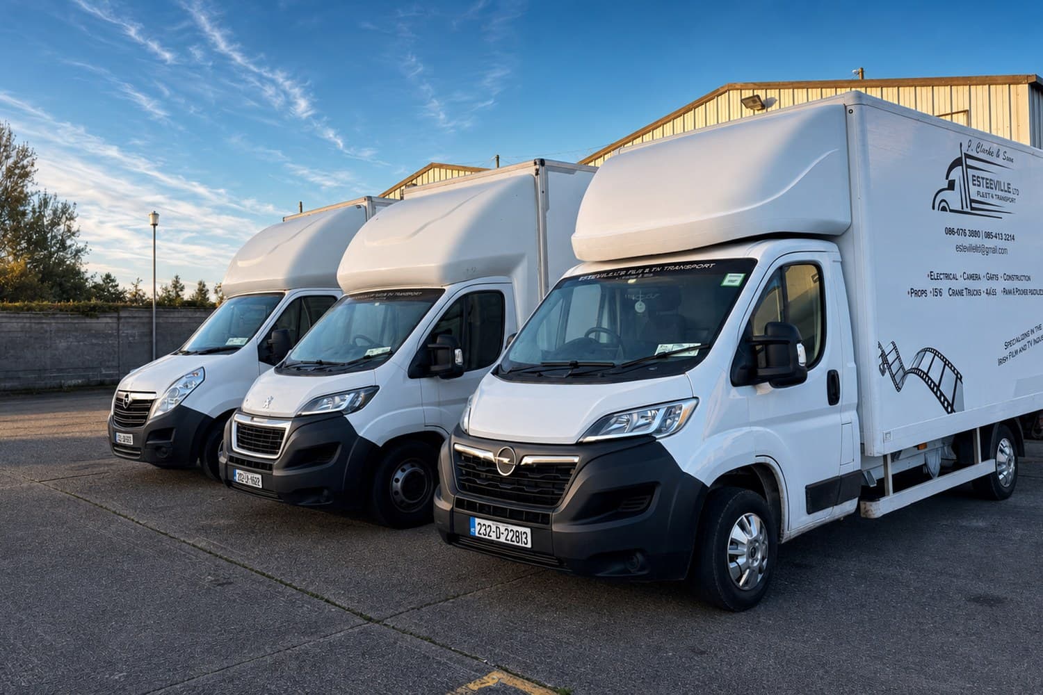 Esteeville Luton vans in the yard, showing the company livery
